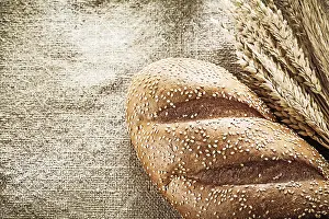 Close Up Bread Prints: Wheat ears bread on burlap background