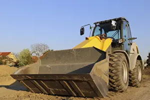 Construction Site Germany Prints: Wheel loader at sunset, here in the RingstraBe development area (Mutterstadt)