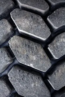 Close Up Car Tire Prints: The wheel of a wheel loader
