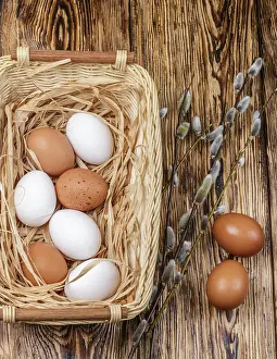 Easter Egg Tradition Prints: White and brown eggs in the basket on the table