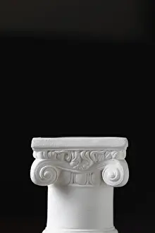 Dark Background Architecture Prints: White ionic design column on dark background