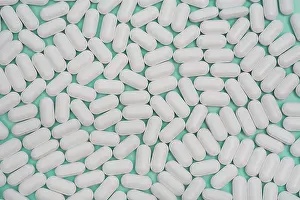 Healthcare System Concept Prints: Many white pills as an abstract background