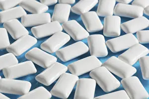 Blue Background Sweets Prints: White rectangular Chewing gums on blue