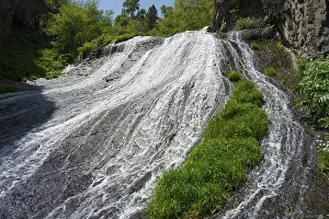 Middle East Nature Scene Prints: A wide waterfall flows steeply down