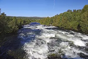 Scandinavian Travel Images Prints: Wild flowing river lined with trees