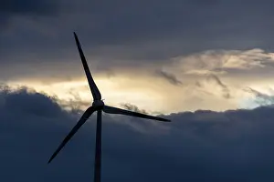 Wind Turbine Germany Prints: Wind turbine in front of dramatic cloudy sky