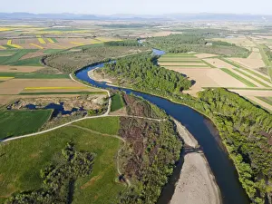 Agricultural Landscape Aerial View Prints: A winding river, bordered by forests and fields