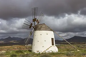 Green Meadow Scene Prints: Windmill, cloudy sky, sideways