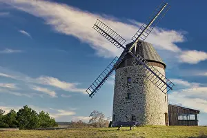 Empty Farm Field Prints: A windmill in the field in the daytime