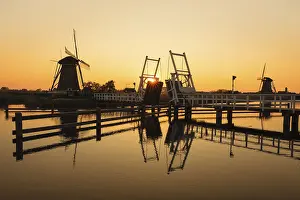 Evening Sun Over Water Prints: Windmills at sunset, Kinderdijk