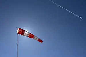 Deserted Airport Scene Prints: Windsock with sun backlighting