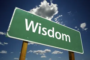 Dramatic Clouds Sky Prints: Wisdom road sign with dramatic clouds and sky