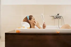 Personal Hygiene Care Prints: Woman checking her expression lines while bathing
