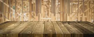 Wood Table Background Prints: Empty wood table surface display background with construction theme behind