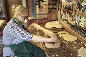 Prints of Work on the lid of the instrument, master luthier Rainer W. Leonhardt, Mittenwald, Bavaria, Germany Related Prints: Work on the Lid of a Musical Instrument Print