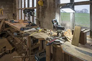 Empty Workstation Setup Prints: Workbench with drill stand and circular saw in a workshop