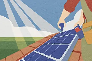 Renewable Energy Systems Prints: A worker is installing solar panels on a rooftop