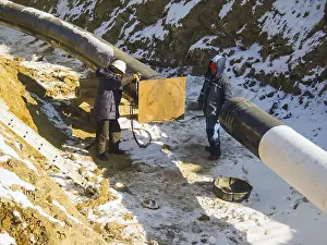 Pipeline Construction Work Prints: The workers engaged in the construction of the pipeline
