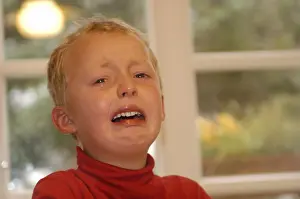 Indoor Portrait Photography Prints: Five year old boy is crying