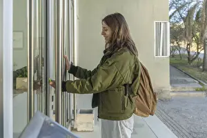 Door Prints: Young Woman in Green Bomber Jacket Print