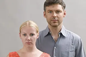 Caucasian Ethnicity Couples Prints: Young couple looking serious