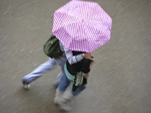 Prints of A young couple under a pink umbrella in rain weather, seen from above, London, England, Europe Weather Prints: A Young Couple Under a Pink Umbrella Print, London