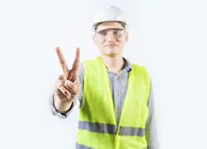 Safety Helmet Image Prints: Young engineer counting number two isolated