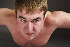 Fitness Training For Men Prints: Young fat man doing push up exercise
