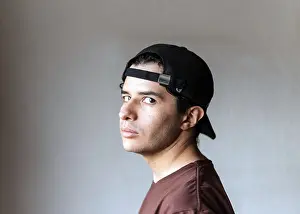 Modern Interior Photography Prints: A young male with a neutral expression