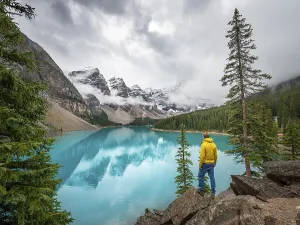 Banff National Park Scenery Prints: Young man looking at mountains