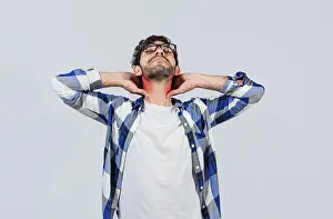 Fitness And Health Issues Prints: Young man with shoulder and neck problems