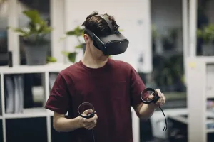 Virtual Reality Goggles Prints: Young man in virtual reality goggles