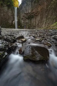 Nature Photography USA Prints: Young man in front of waterfall