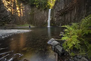 Abiqua Falls Oregon Prints: Young man in front of waterfall