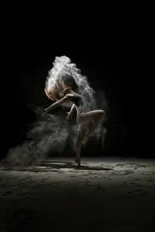 Athletic Female Model Prints: Young model dancing in a cloud of white dust studio shot