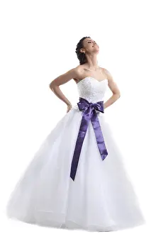 Wedding Celebration Prints: Young smiling bride posing in studio