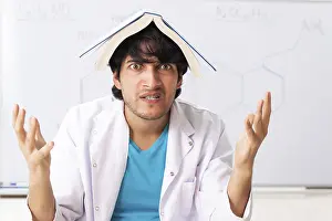 Educational Institution Images Prints: Young student chemist in the classroom