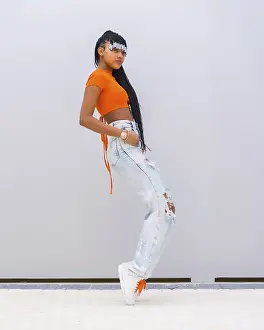 Gray Background Model Prints: A young trap dancer with braids