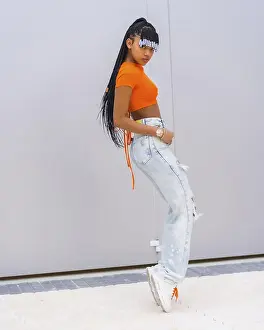 Young Trap Dancer Prints: A young trap dancer with braids
