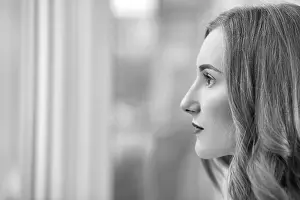 Monochrome Portrait Prints: Serious young woman profile with copyspace
