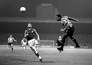 Cyrille Regis Prints: West Ham United v West Bromwich Albion Print, Cyrille Regis in mid-air