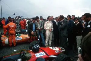 Graham Hill Prints: British GP 1968 Print: Graham Hill with Prince Charles and Lord Mountbatten