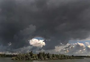 Images Dated 13th August 2019: Biesbosch Print: A serene cloud formation above the Biesbosch landscape