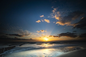 Sunset On The Coast Prints: Breakers on the North Sea beach