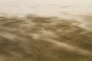 Stormy Beach Scene Prints: Drifting sand
