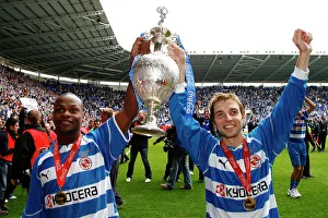 Lita and Convey Rasie the Championship Trophy Lita and Convey Rasie the Championship Trophy